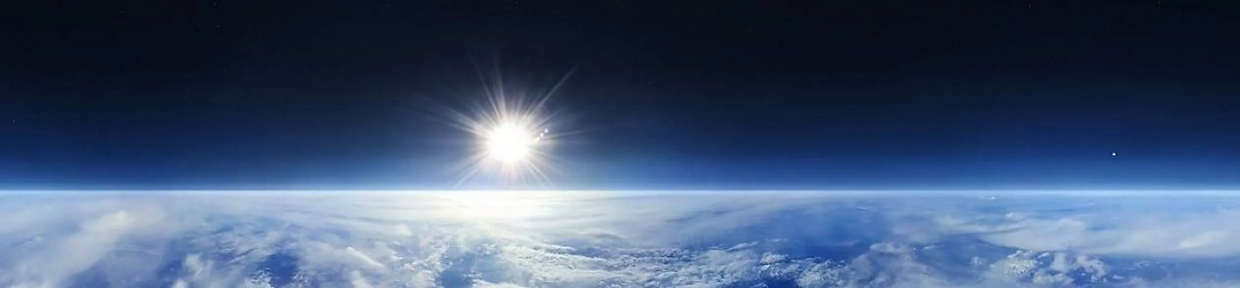 The sun shining over the vast, flat plane of Earth β the horizon stretches level and unbroken